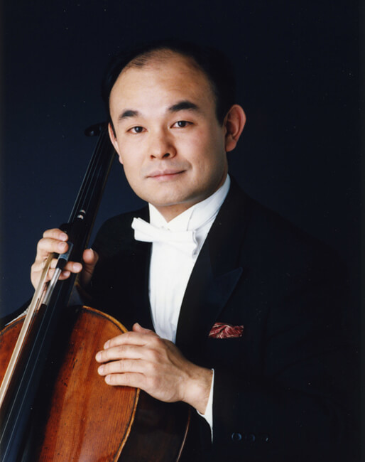 Tomoya Kikuchi profile photo holding a stringed instrument
